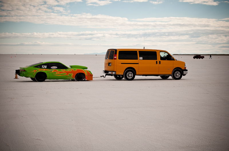  bright yellow van and neon highlighter green and yellow Chevy Monza